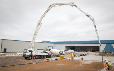 How Far Can A Boom Pump Reach On A Construction Site?